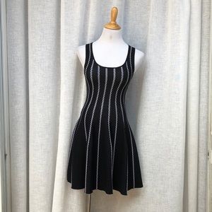 G.I.N sleeveless black and white knit stretch mini dress